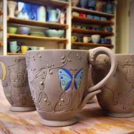 Colorized stamped mugs in process
